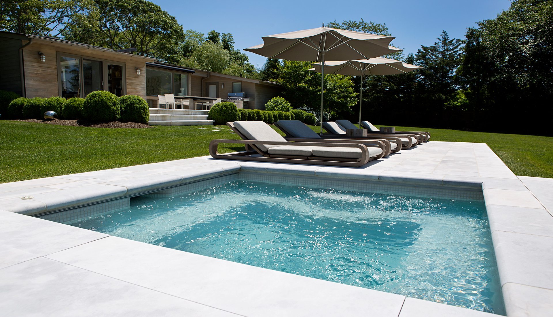 Hamptons Builder | outdoor fireplace | masonry | gunite pool